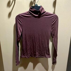 Medium brown turtle neck top